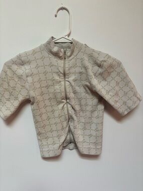 Urban Outfitters Neutral Geo Pattern Zip-Front Baby Crop Top - Cream